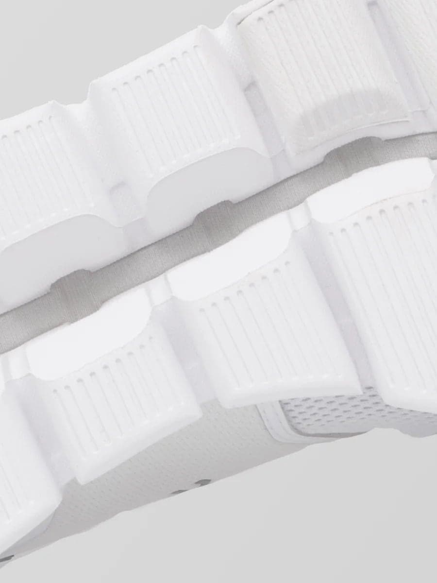 Close-up of a white Helion technology with a focus on the sole.