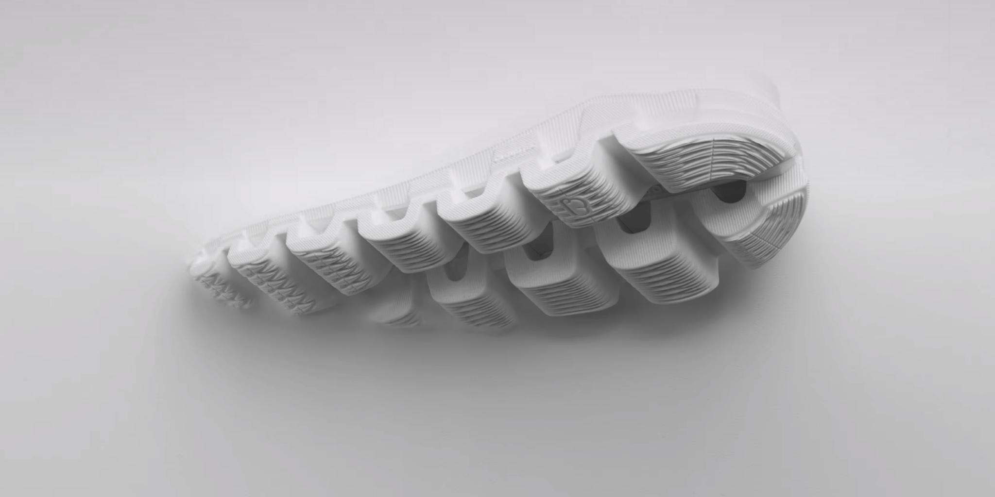 On Helion Technology Header image of a sole sinking into a white background
