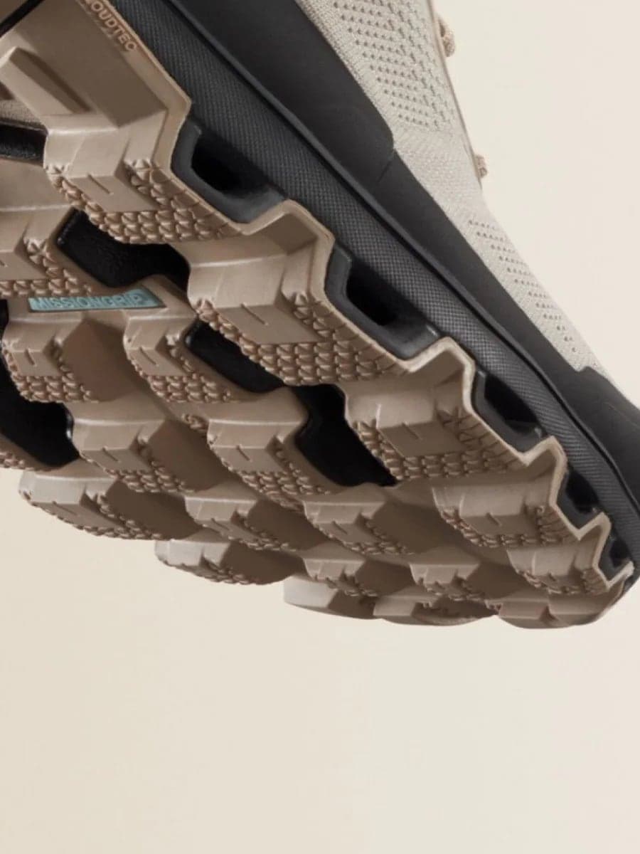 Close-up of a Missiongrip Cloudventure Sole shoe sole with tread pattern on a beige background
