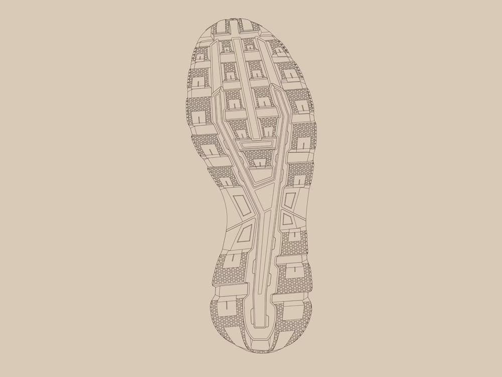 Top view of a shoe sole with Missiongrip pattern on a beige background