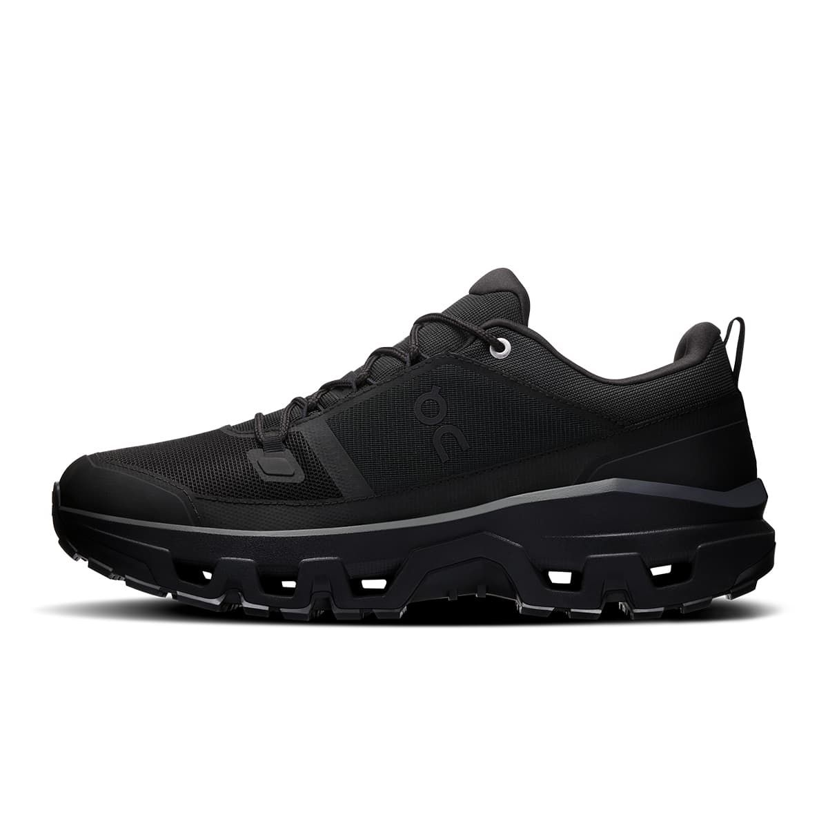 Left side view of the On Cloudrock Low Black Black men’s running shoe
