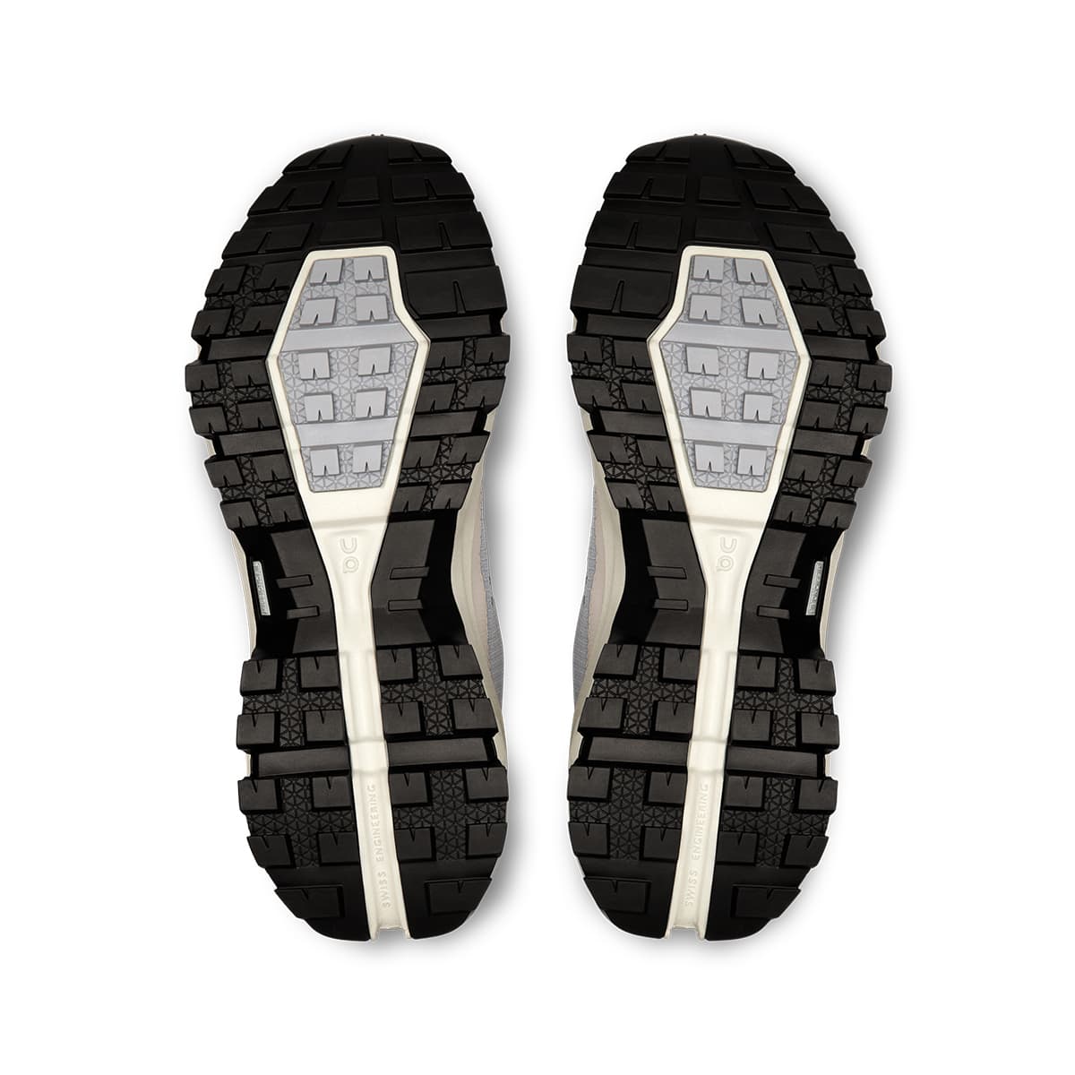 Soles of the On Cloudrock Mid Alloy Ice women’s running shoes