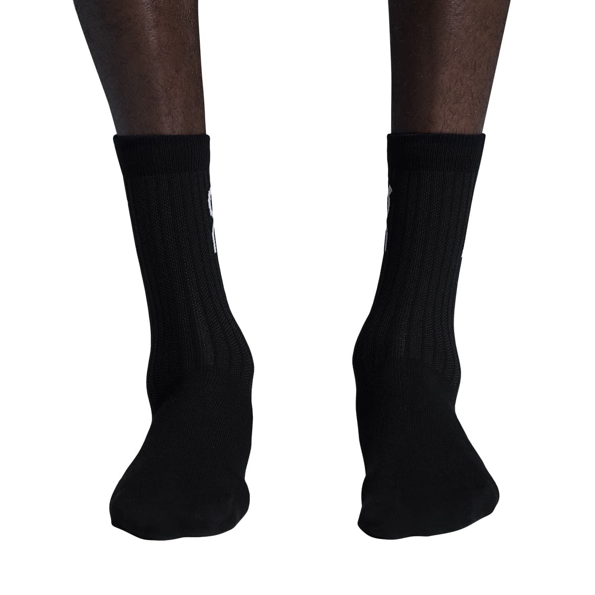 Model wearing the On Logo Sock High 3P Colour Black - Front View