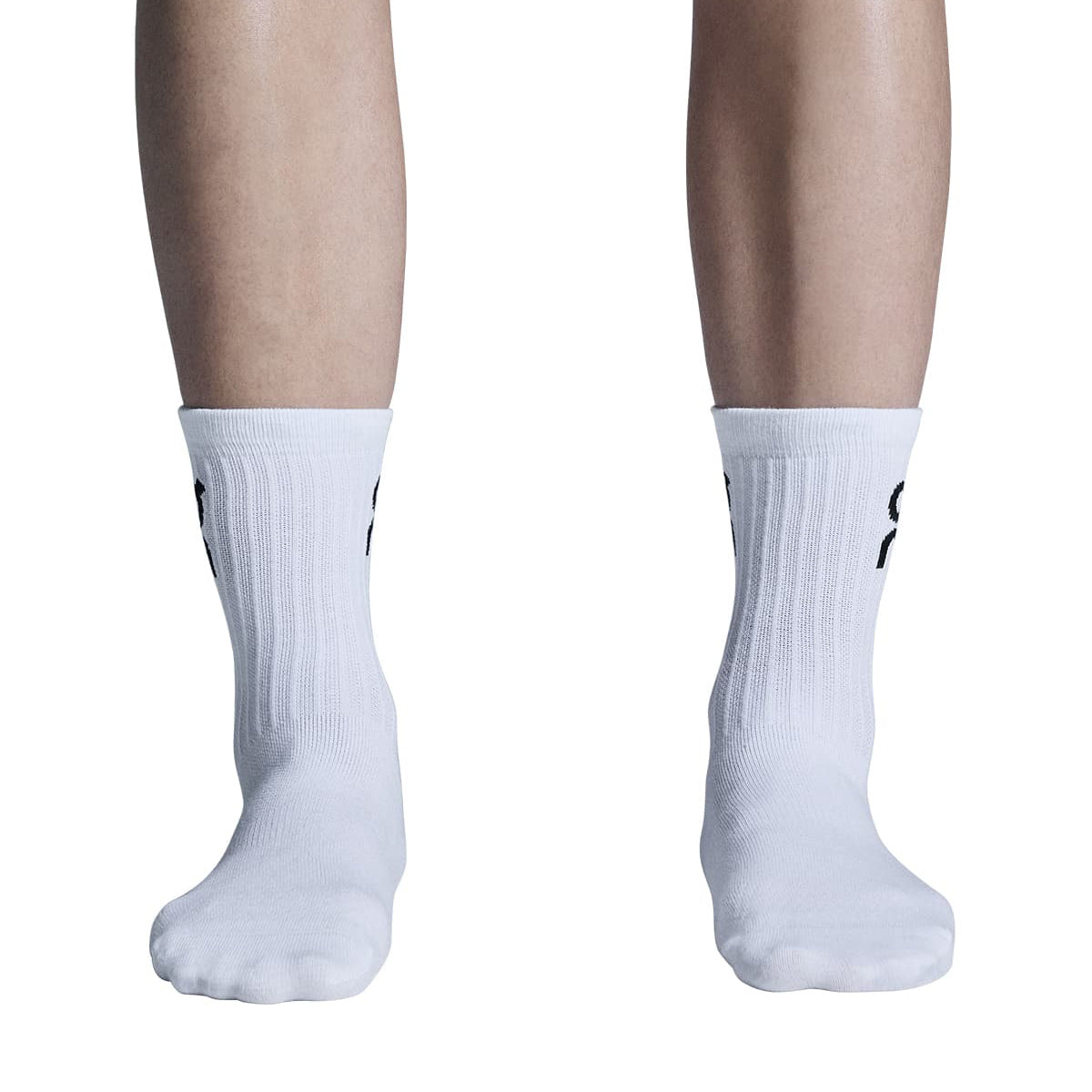 Model wearing the On Logo Sock High 3P Colour White - Front View