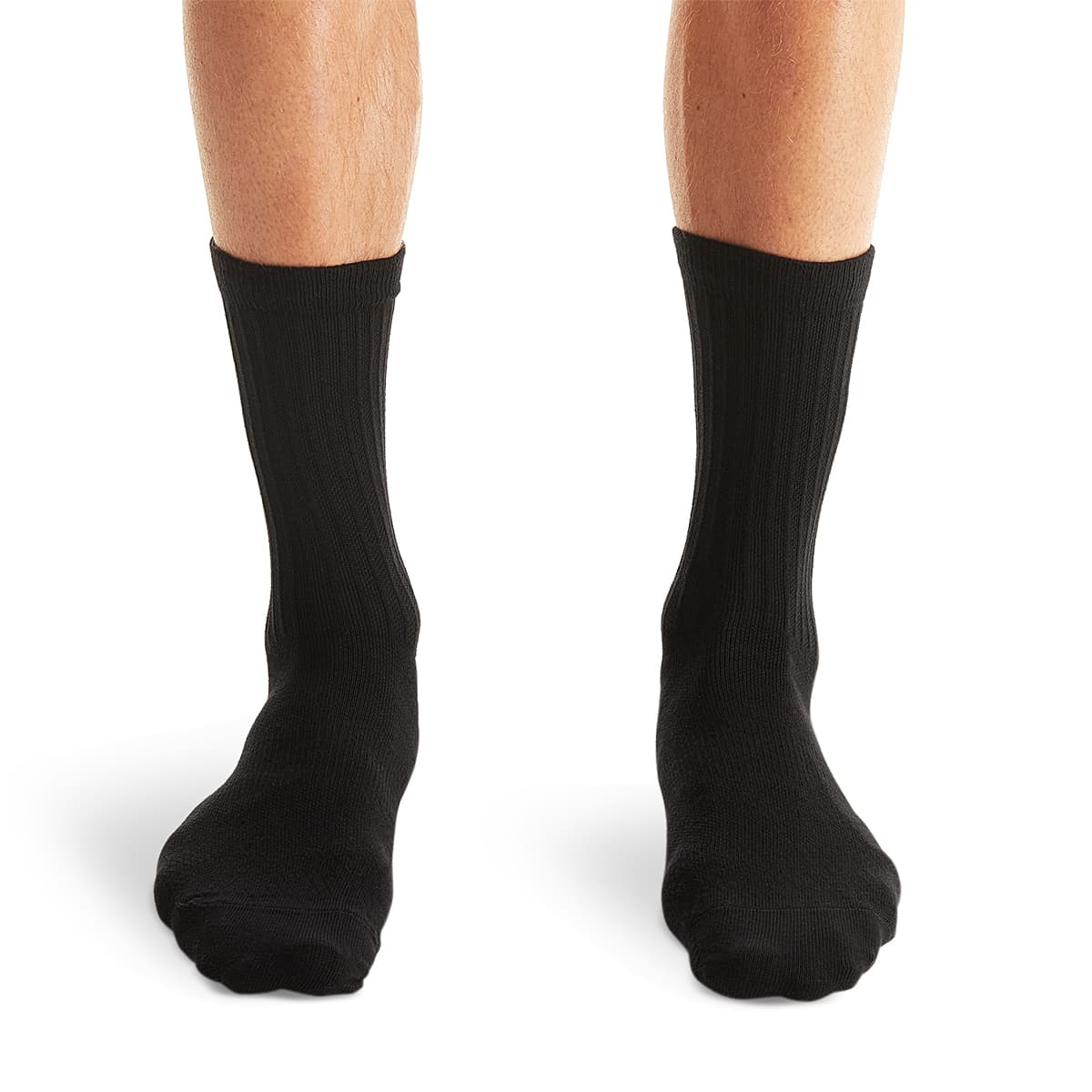 Man wearing the On Logo Sock 3 Pack Colour Black - Front Angle