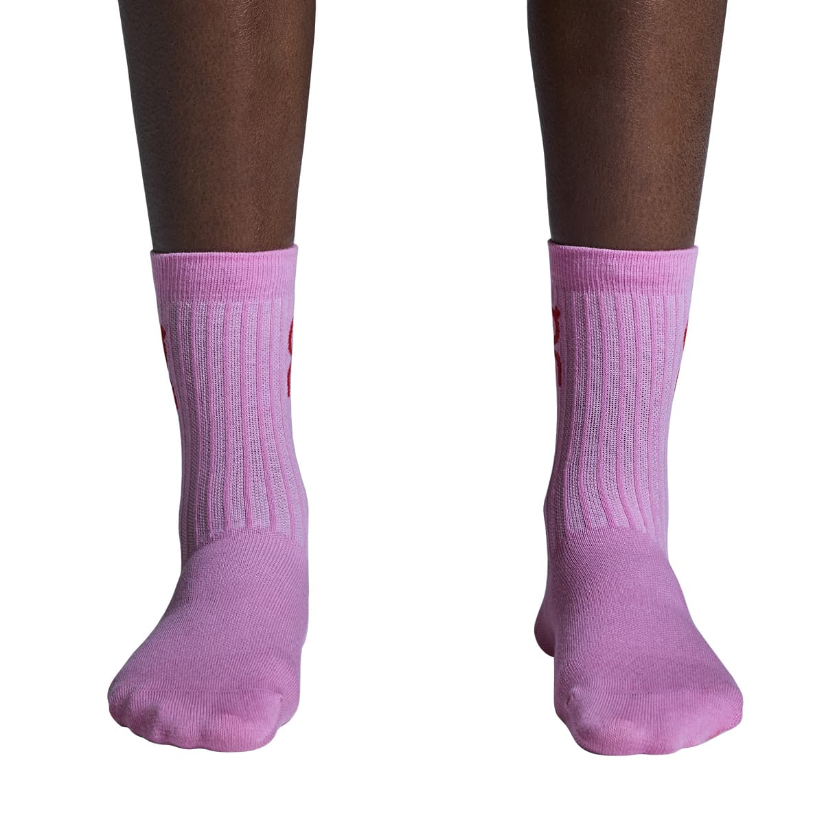 Model wearing the On Logo Sock 3 Pack Colour Mauve Raspberry - Front View