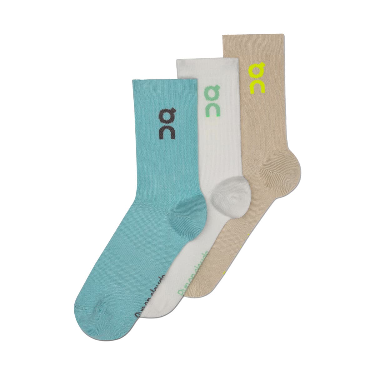 Flat lay of the On Logo Sock 3-Pack in Desert Wash showing all three color variations #color_desert-wash