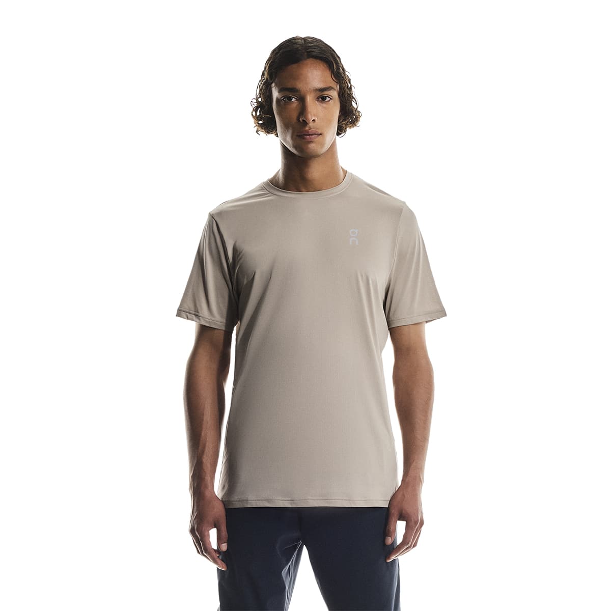 Male model wearing the On Apparel - Core T Colour Desert, shown from the front