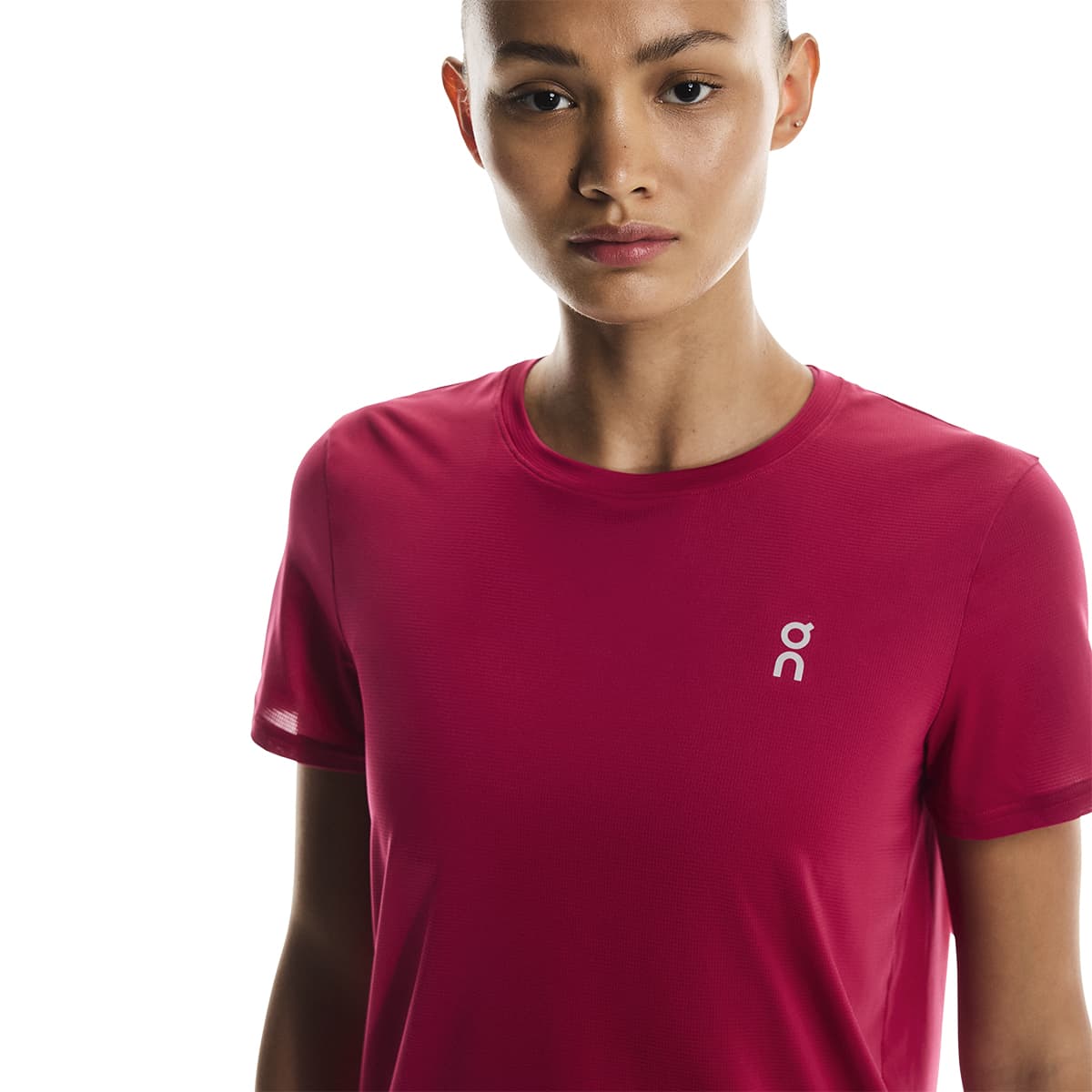 Woman wearing the On Apparel - Core T Colour Grenadine, shown in front-facing close-up