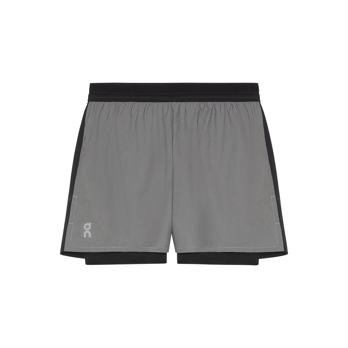 Flat lay of the On Performance Shorts Lumos in Black showing front logo detail