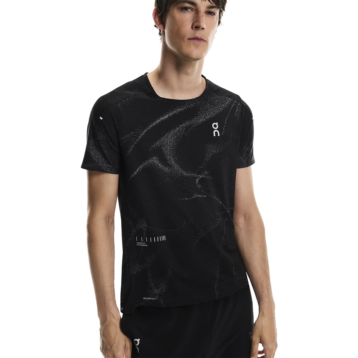 Male model wearing the On Apparel - Performance T Lumos Colour Black, shown from the front