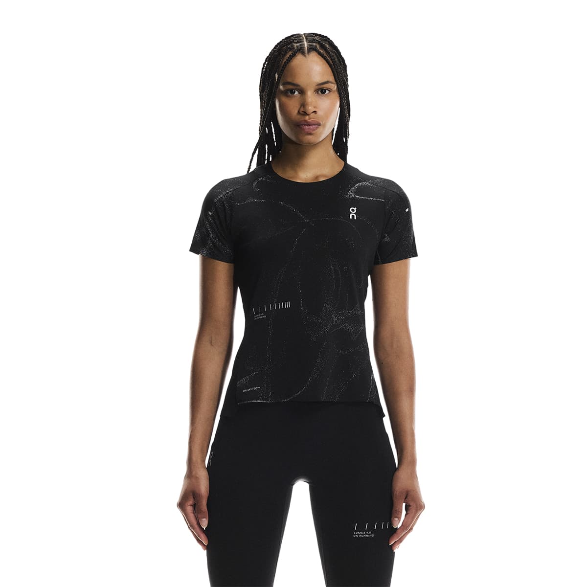 Female model wearing the On Apparel - Performance T Lumos Colour Black, shown from the front