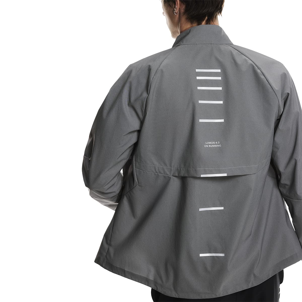 Close up rear view of a male model wearing the On Weather Jacket Lumos Colour Eclipse
