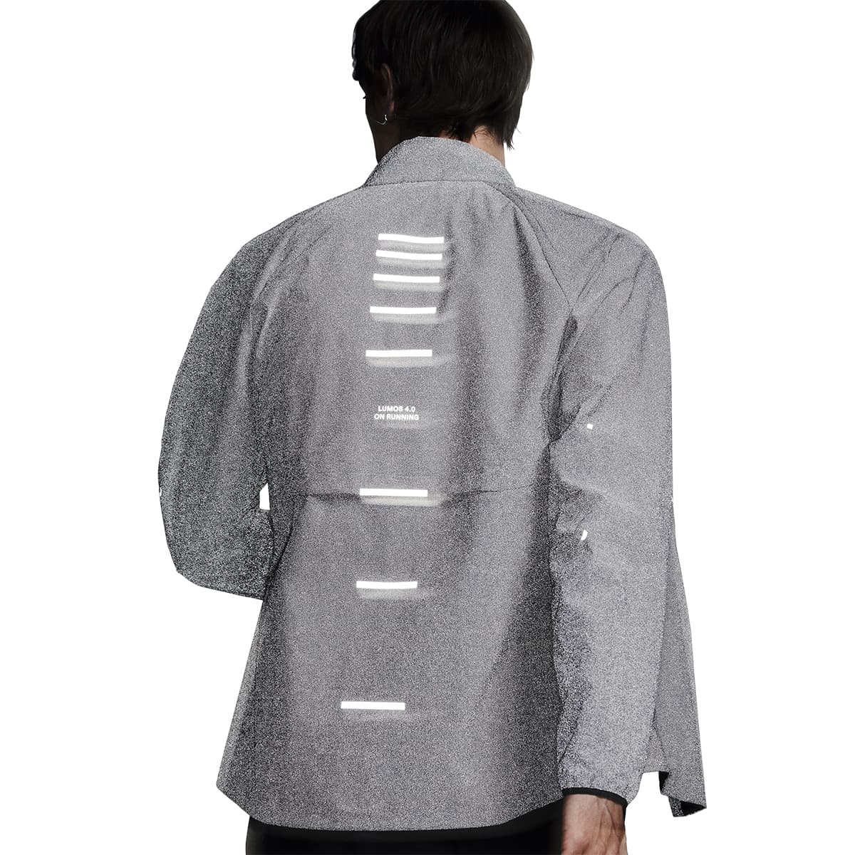 Rear view highlighting reflective detail of the On Weather Jacket Lumos Colour Eclipse