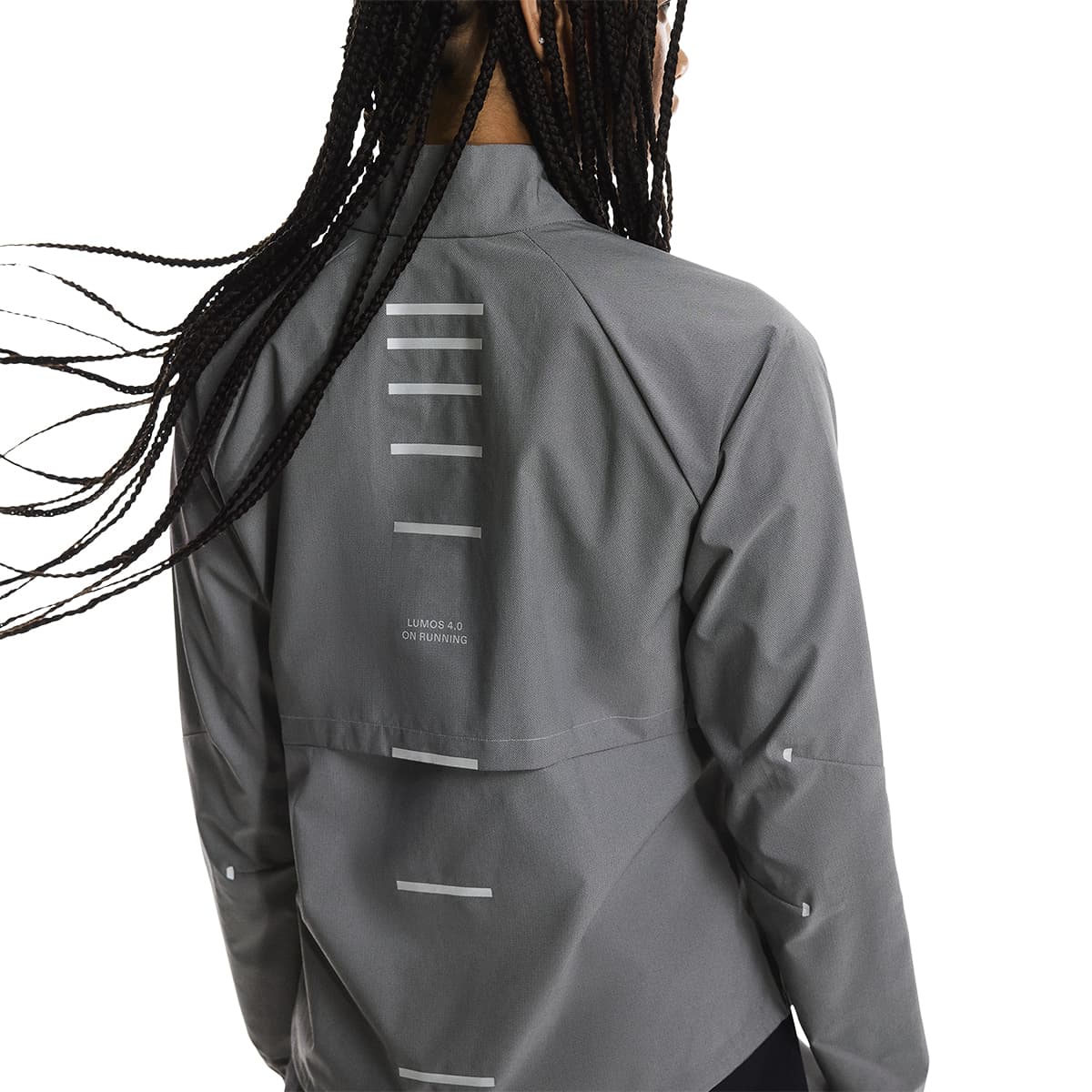 Close up rear view of a female model wearing the On Weather Jacket Lumos Colour Eclipse