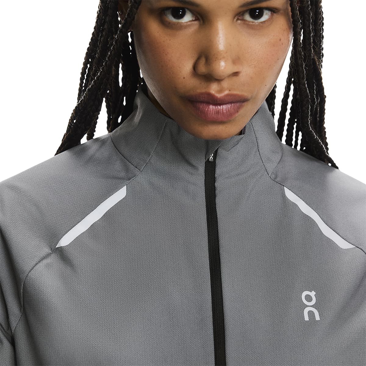 Close up view of collar and reflective detail of the On Weather Jacket Lumos Colour Eclipse