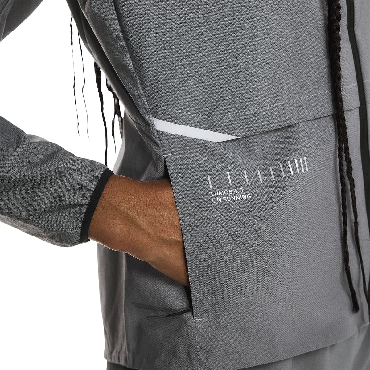 Front reflective detail of the On Weather Jacket Lumos Colour Eclipse