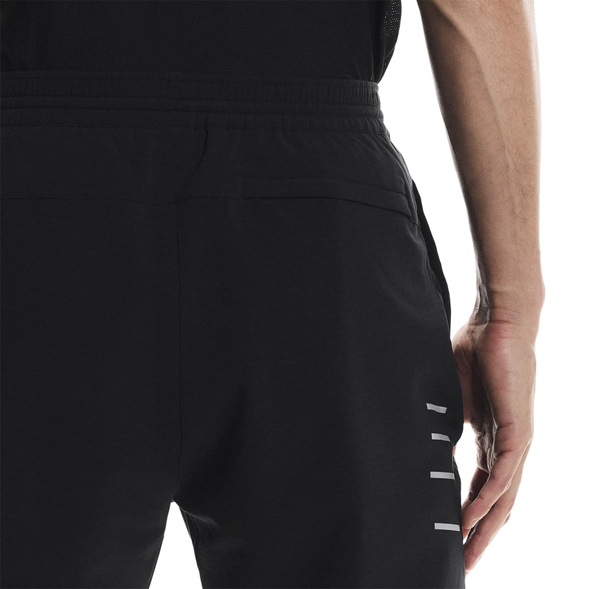 Close-up of waistband and back pocket of the On Weather Pants Lumos in Black
