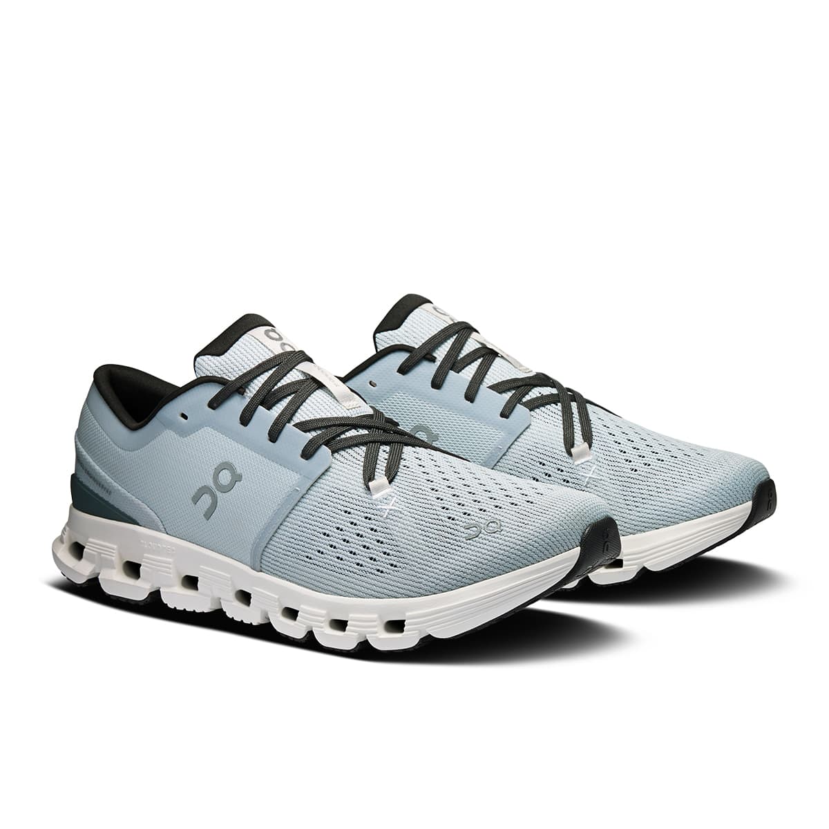 45-degree view of the On Cloud X4 Glacier-Stone men’s running shoe