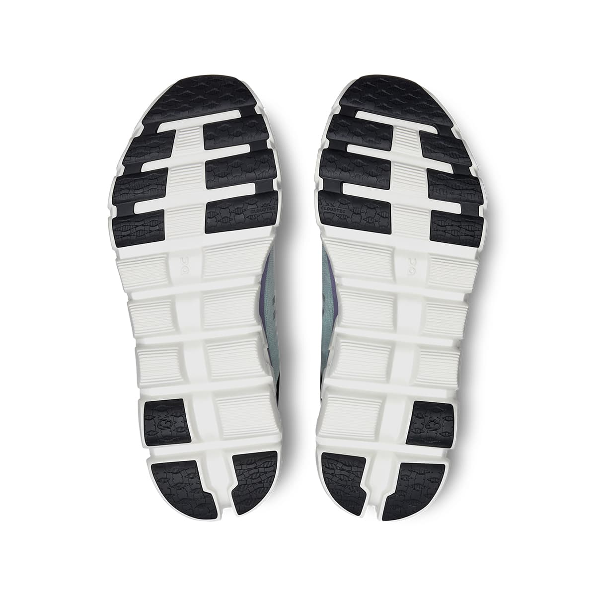 Soles of the On Cloudflow 4 Fade-Wisteria women’s running shoes