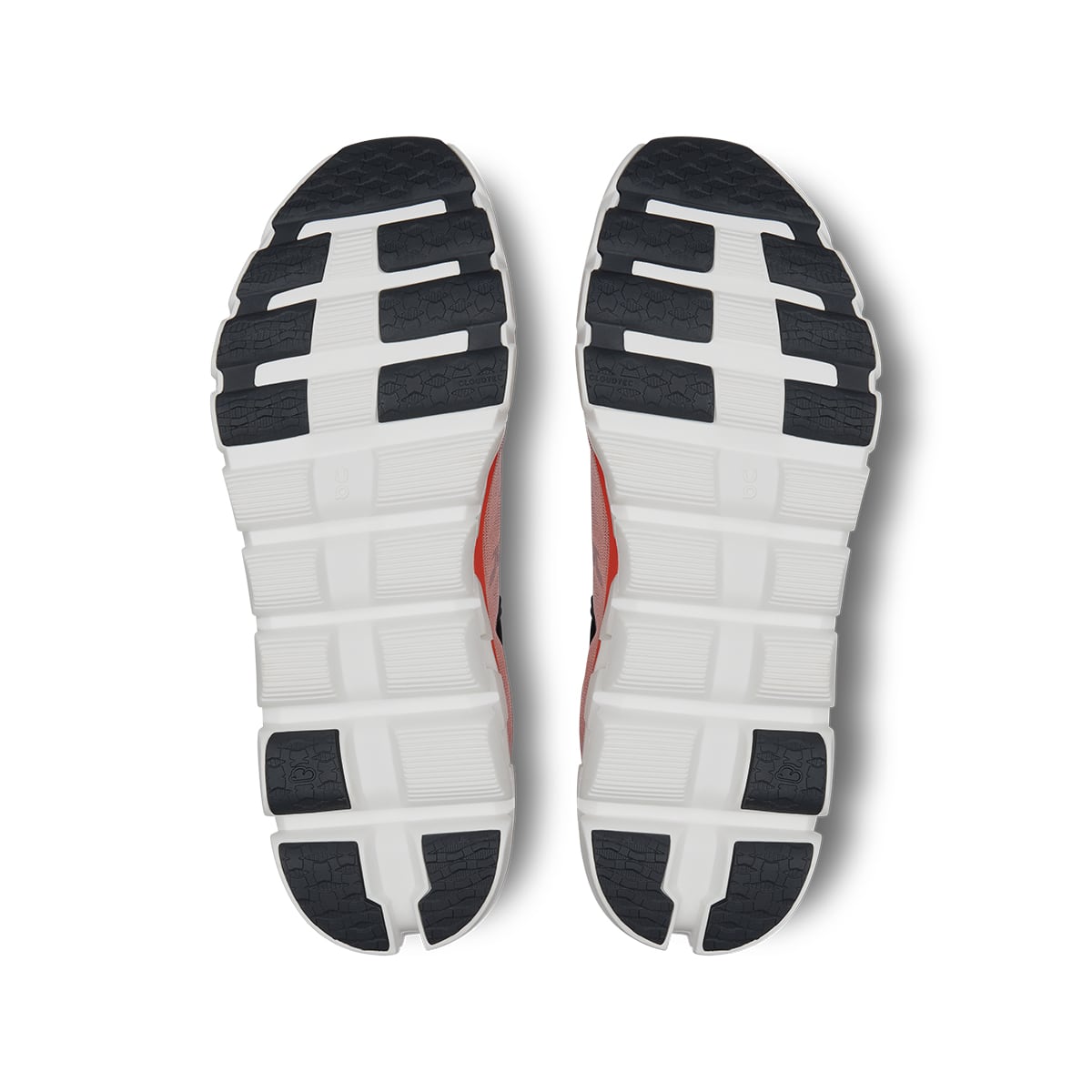 Soles of the On Cloudflow 4 Quartz-Flame men’s running shoes