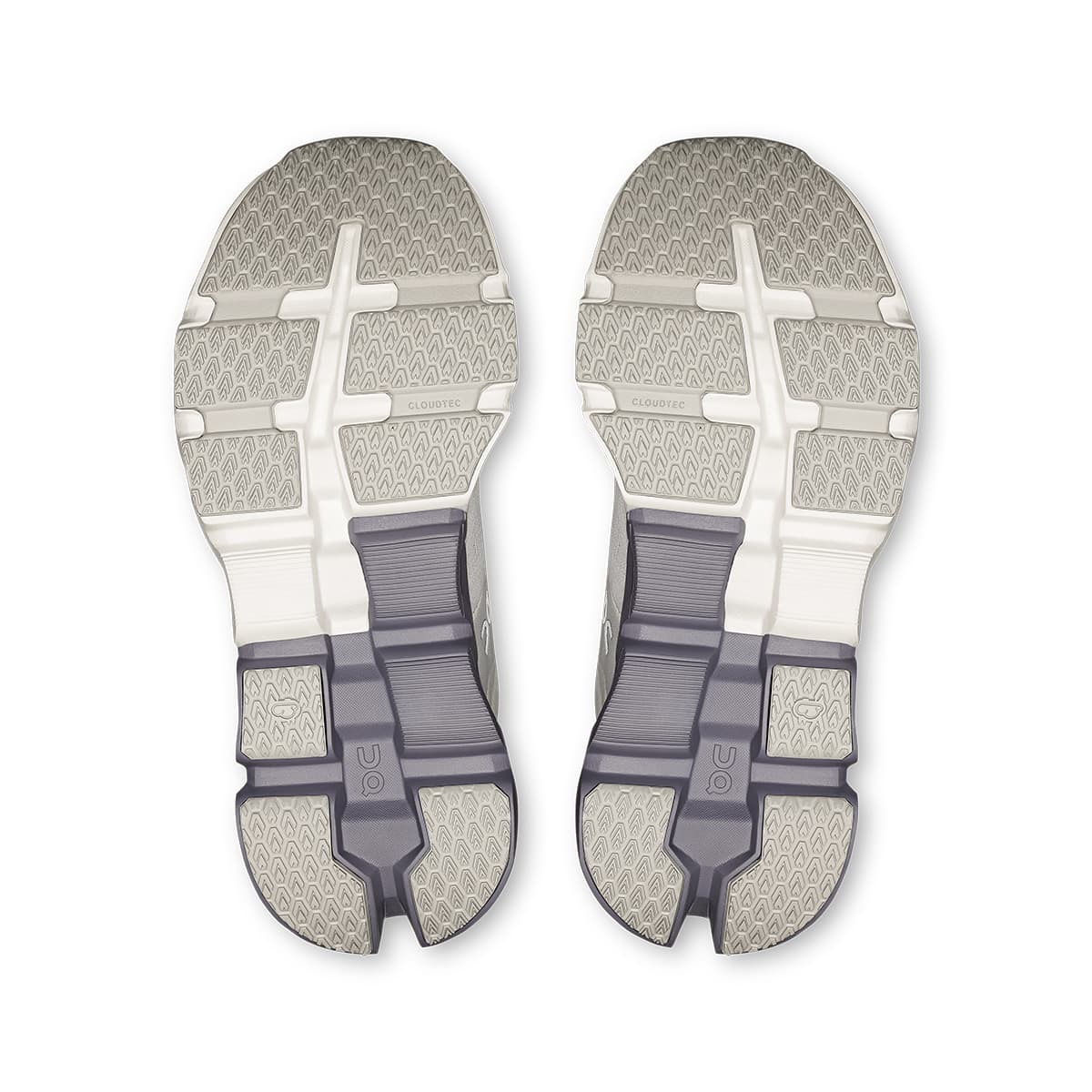 Soles of the On Cloudflyer 5 White-Lilac women’s running shoes