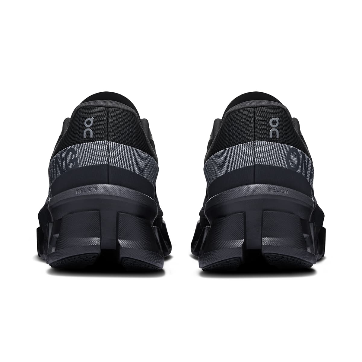 Back view of the On Cloudmonster 2 Black Black men’s running shoe