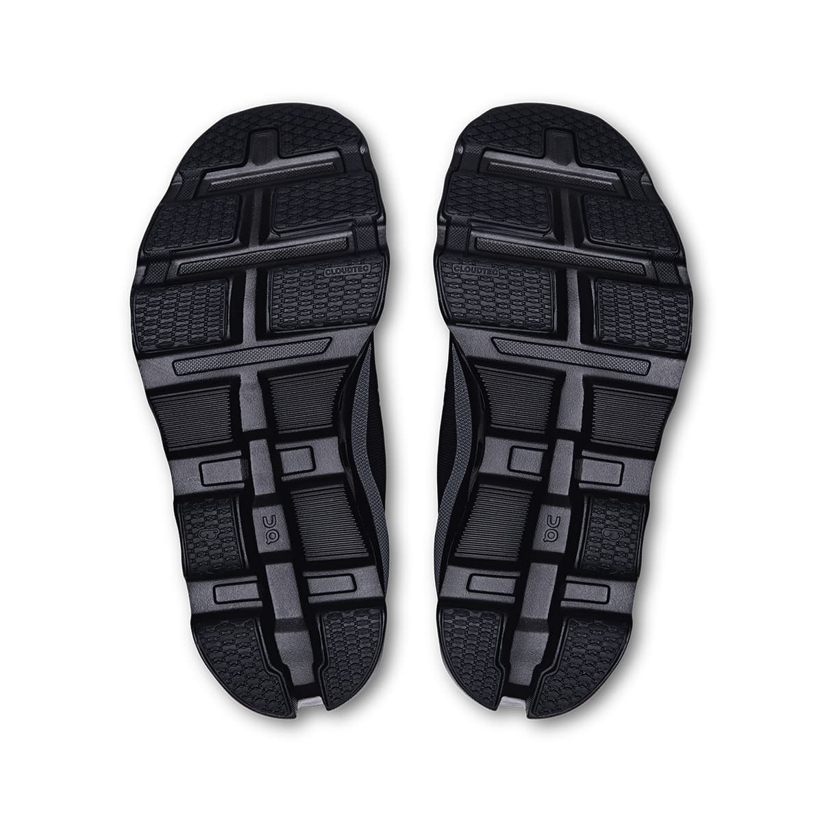 Soles of the On Cloudmonster 2 Black Eclipse women’s running shoes