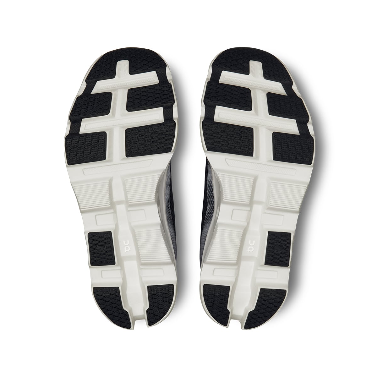 Soles of the On Cloudmonster 2 Black Frost women’s running shoes