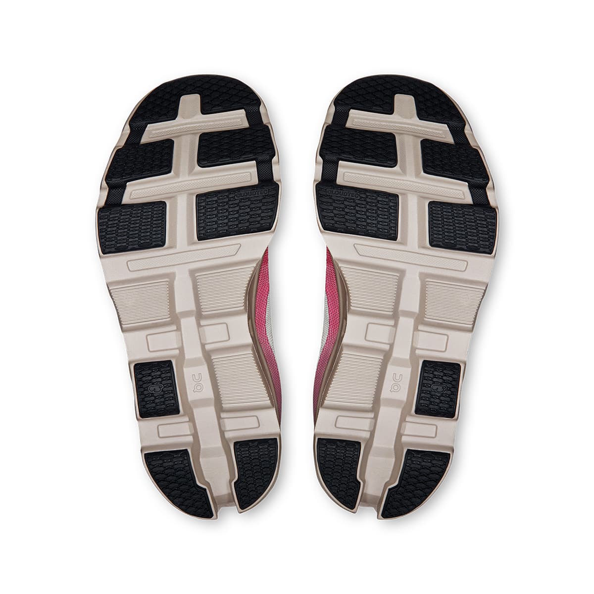 Soles of the On Cloudmonster 2 Ivory-Red women’s running shoes