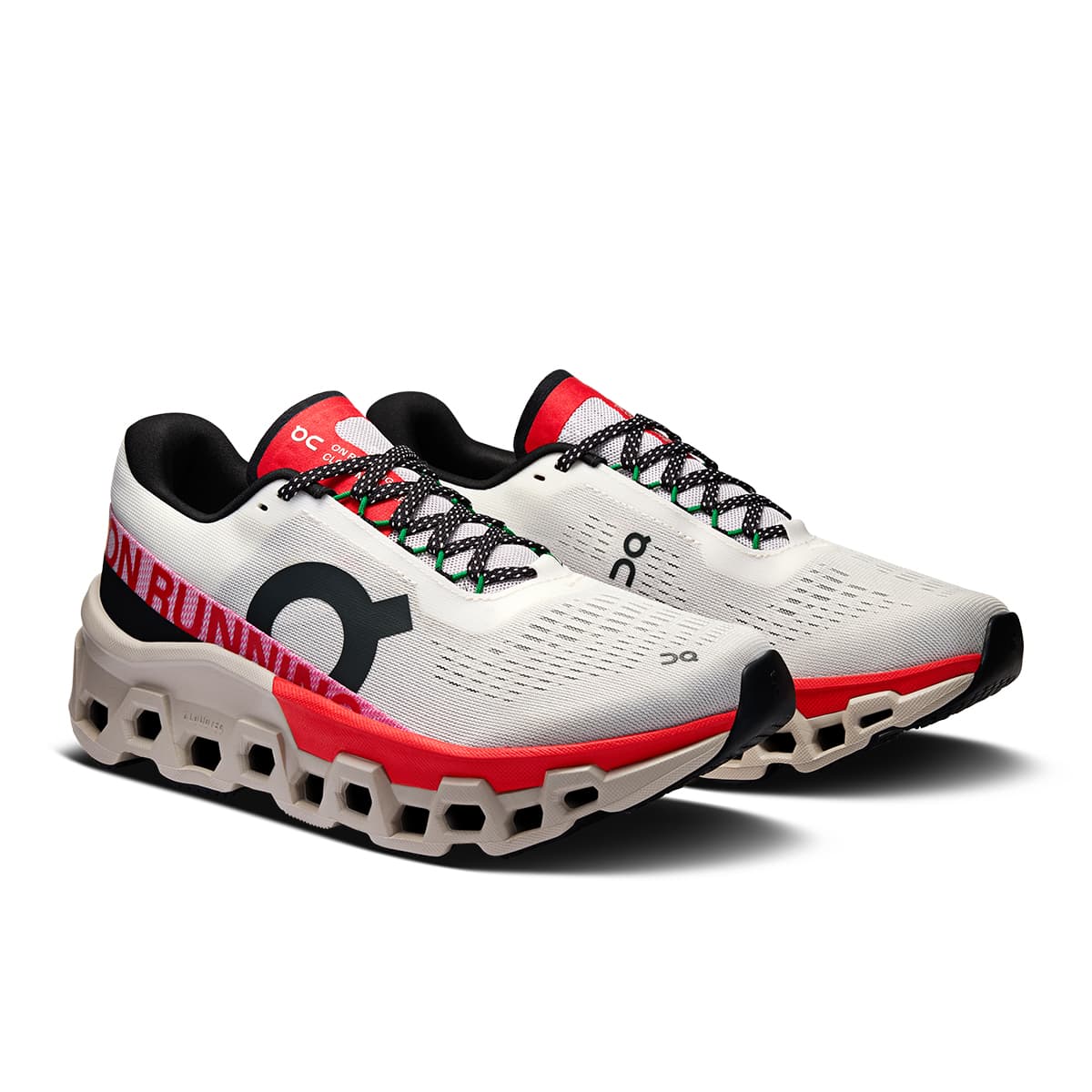 45-degree view of the On Cloudmonster 2 Ivory-Red women’s running shoe