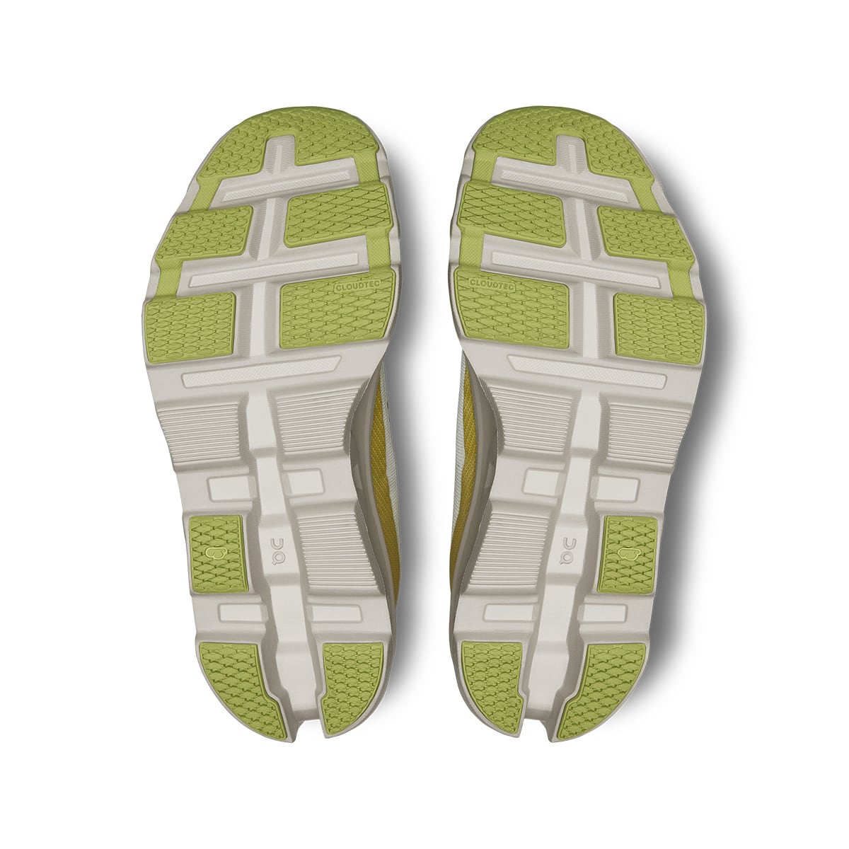 Soles of the On Cloudmonster 2 Undyed Zest women’s running shoes