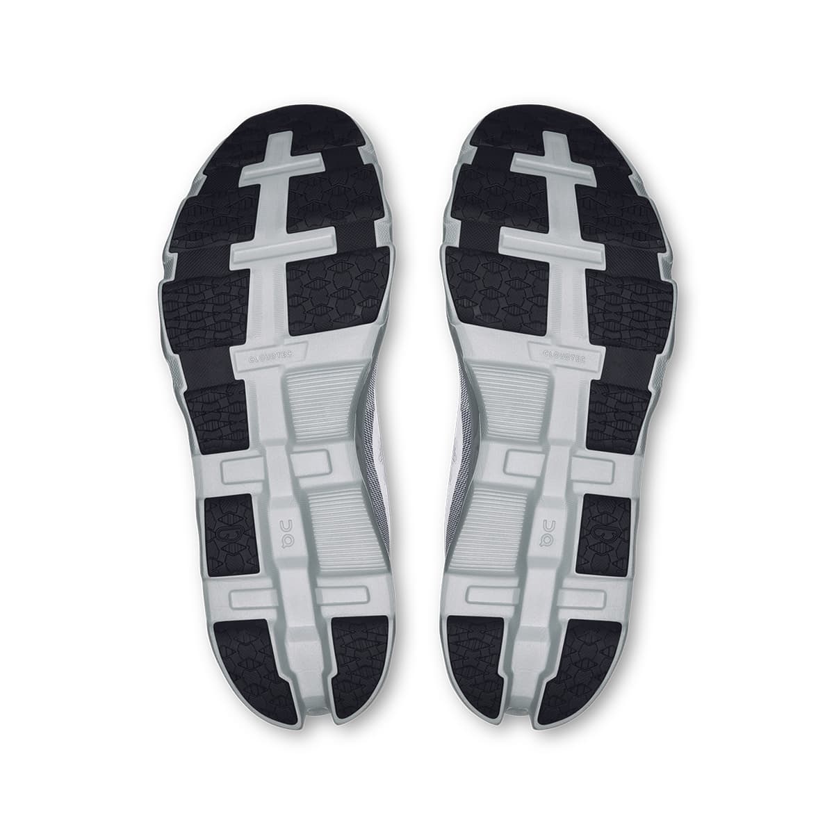 Soles of the On Cloudmonster Hyper Glacier Ivory men’s running shoes