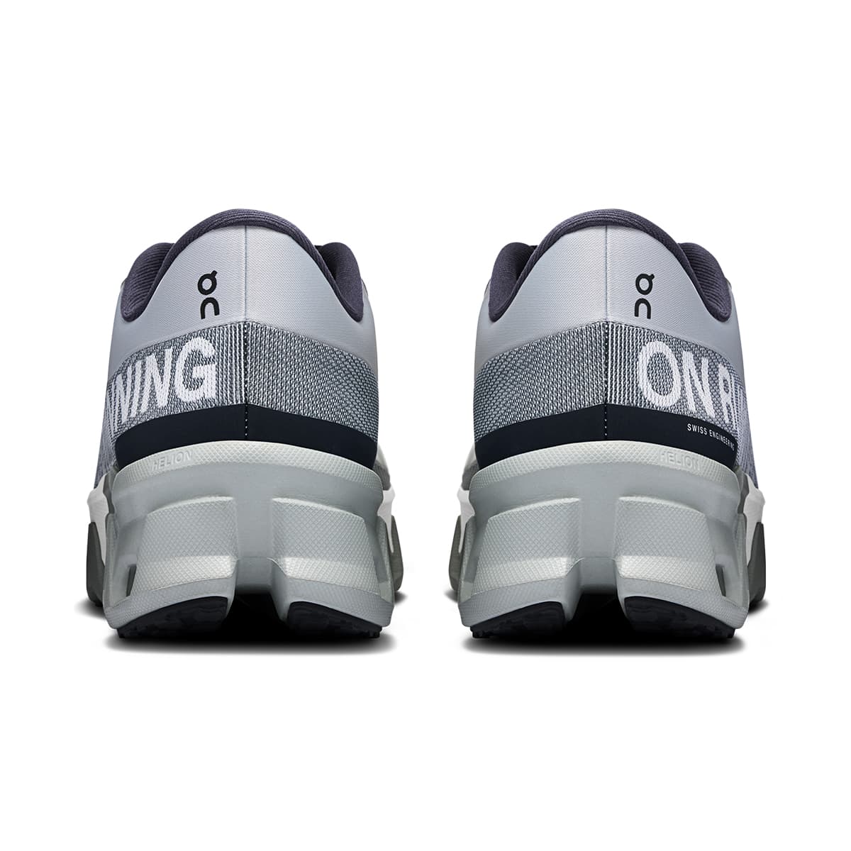 Back view of the On Cloudmonster Hyper Glacier Ivory men’s running shoe