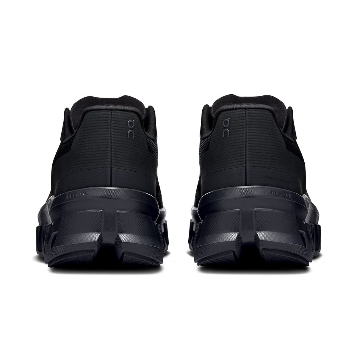 Back view of the On Cloudmonster Void Black Black men’s running shoe