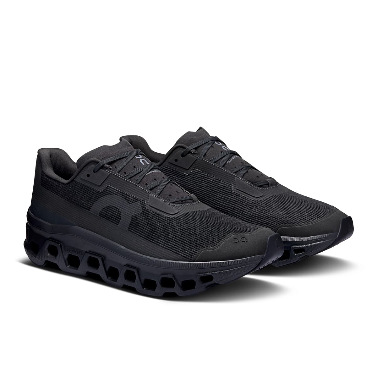 45-degree view of the On Cloudmonster Void Black Black men’s running shoe