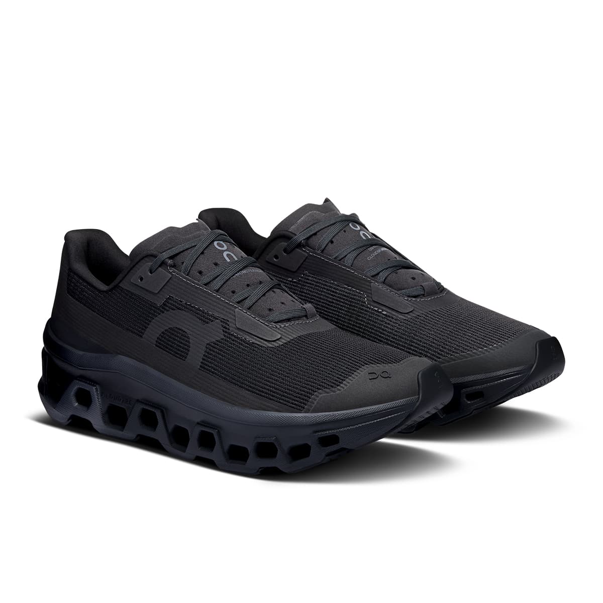 45-degree view of the On Cloudmonster Void Black-Black women’s running shoe