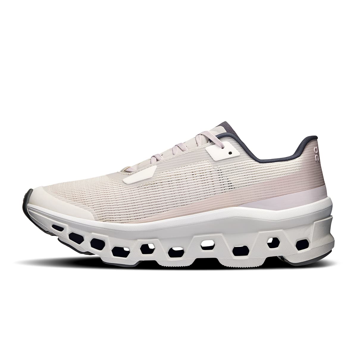 Left side view of the On Cloudmonster Void Ivory-Wolf women’s running shoe