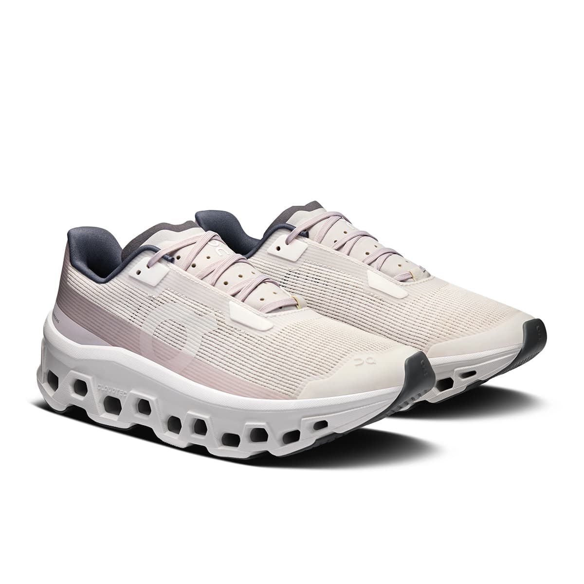 45-degree view of the On Cloudmonster Void Ivory-Wolf women’s running shoe