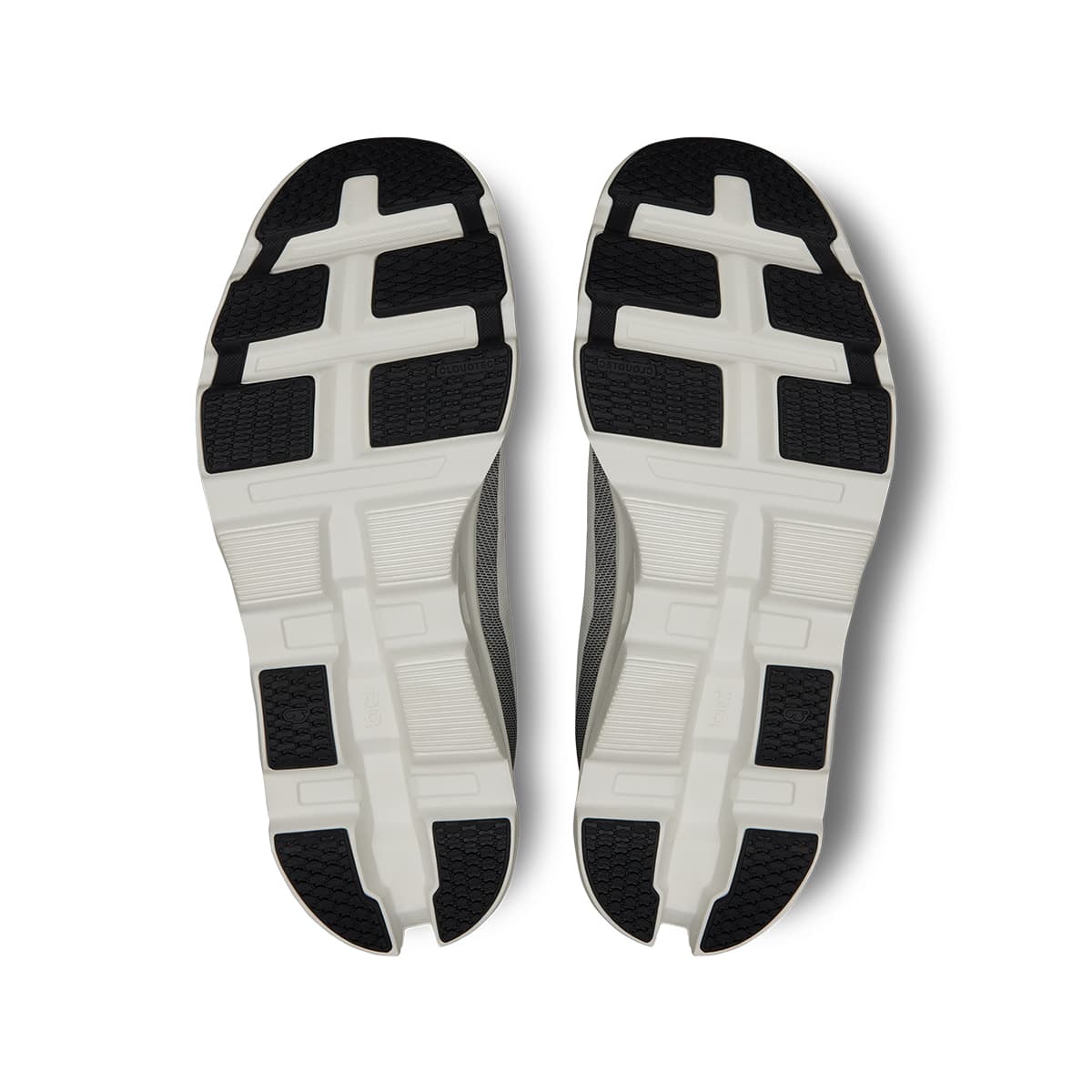 Soles of the On Cloudmonster 2 White-Frost men’s running shoes