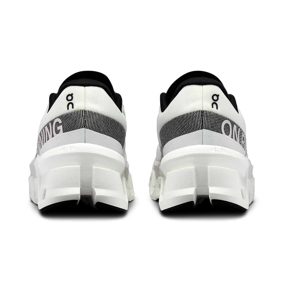 Back view of the On Cloudmonster 2 White-Frost women’s running shoe