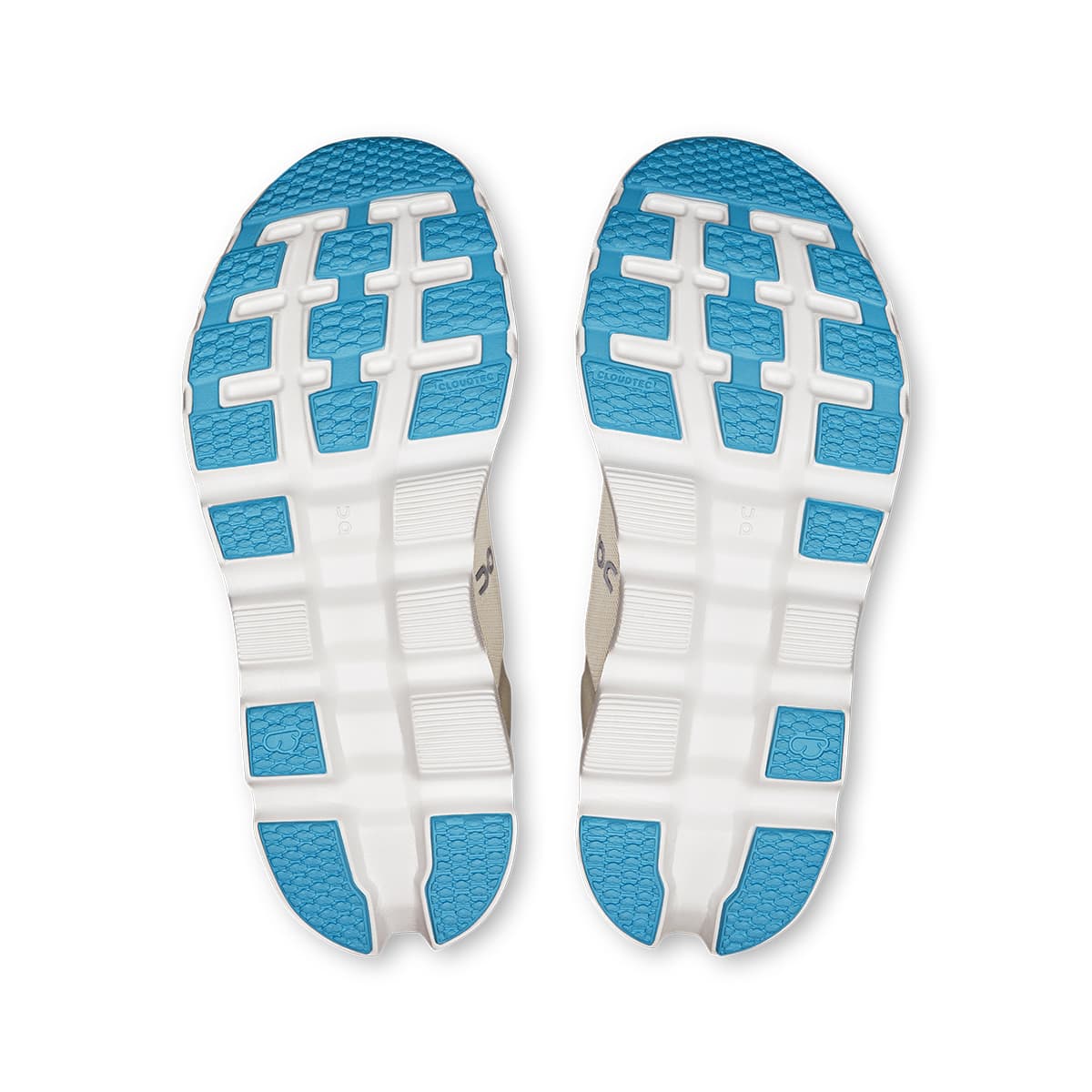 Soles of the On Cloudstratus 3 Cream-Arctic women’s running shoes