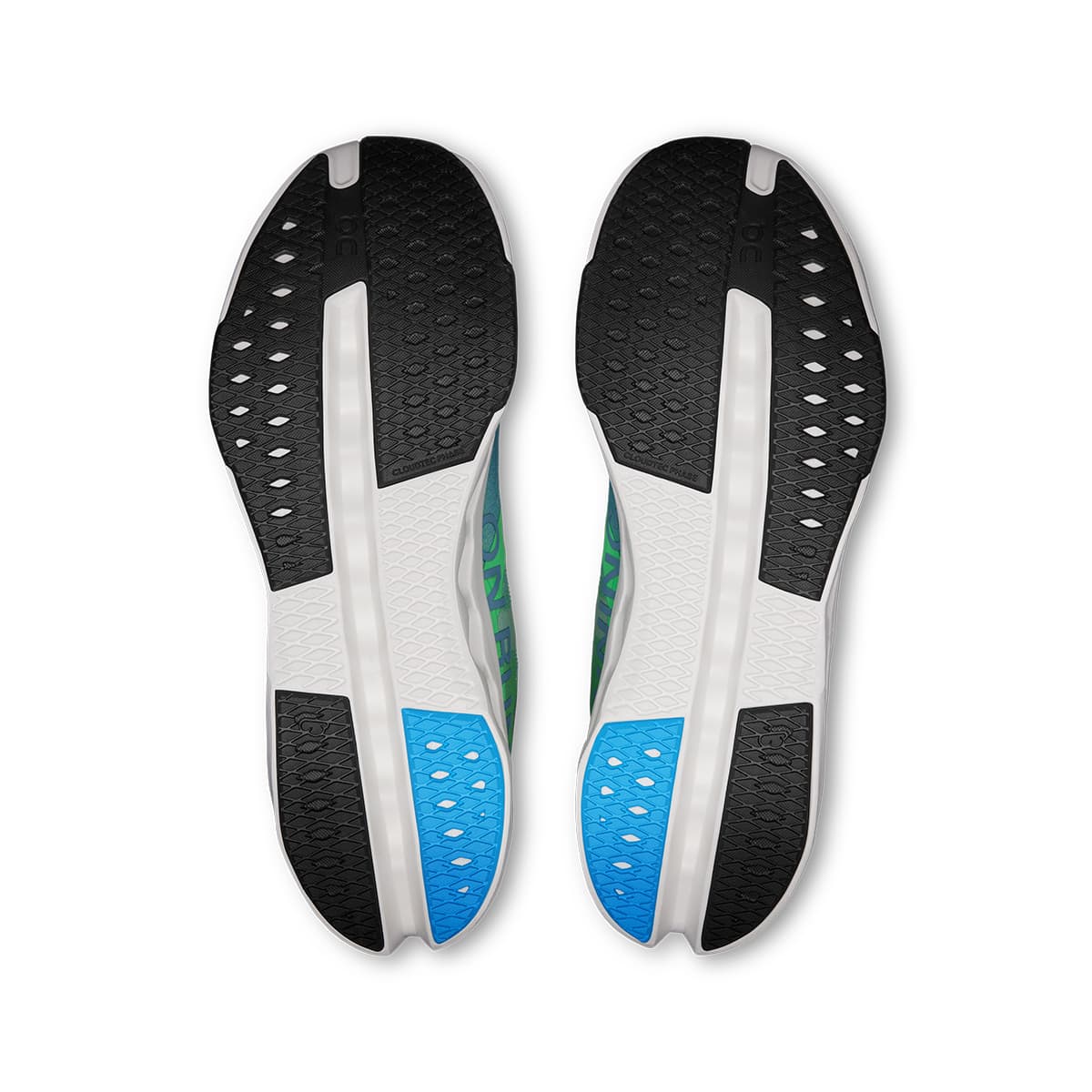 Soles of the On Cloudsurfer Next Honeydew Ivory men’s running shoes