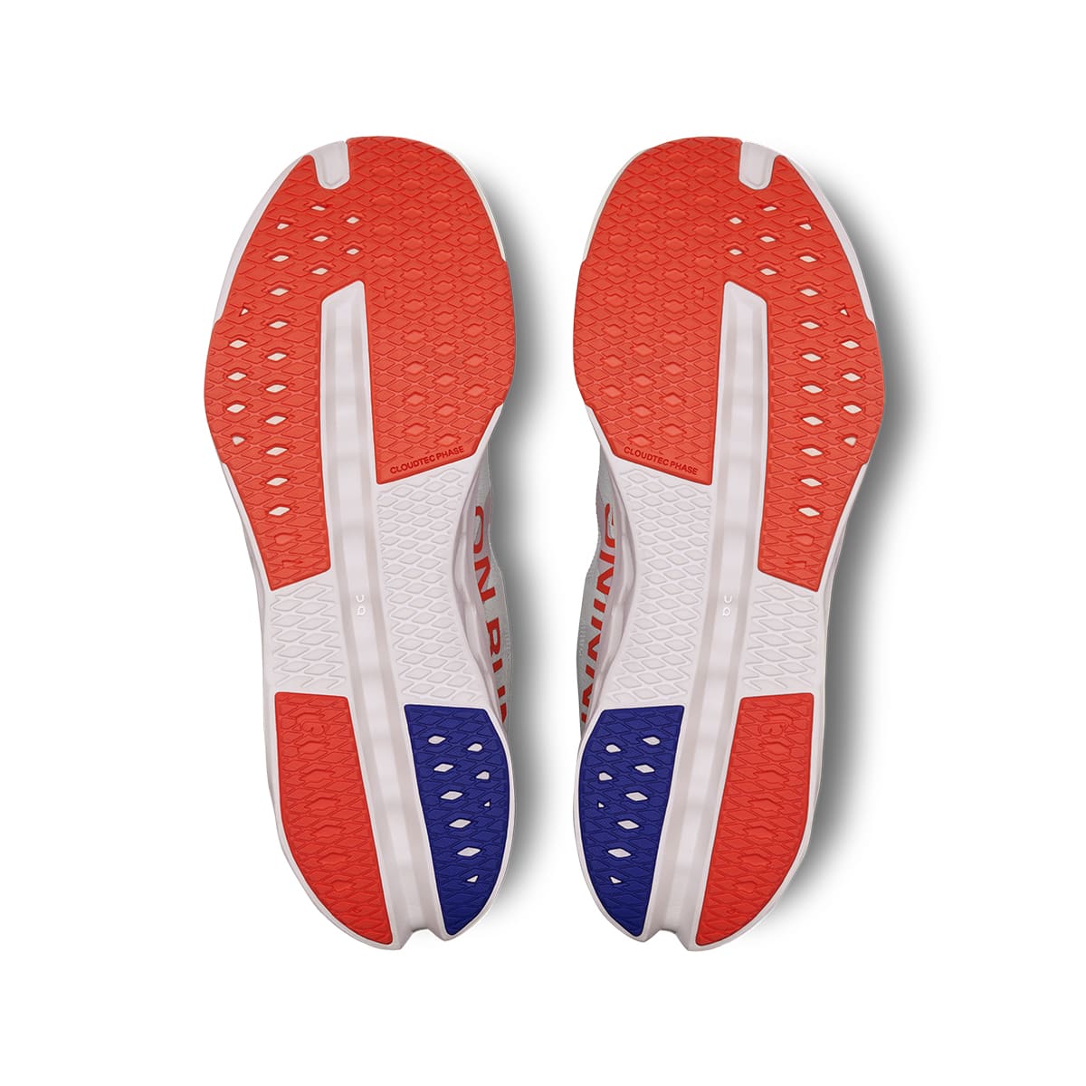 Soles of the On Cloudsurfer Next White Flame men’s running shoes