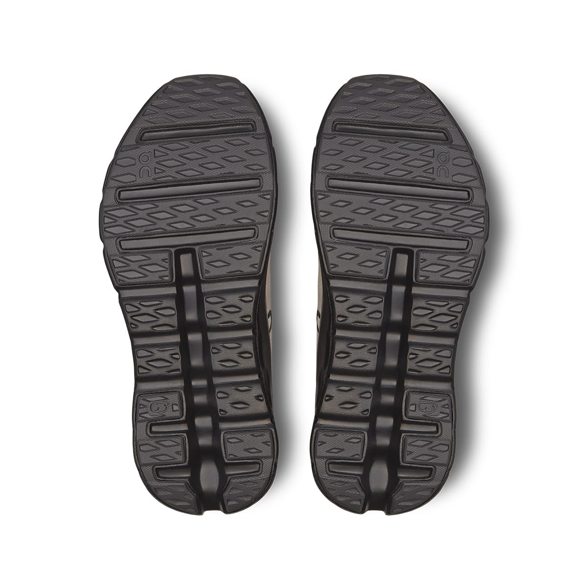 Soles of the On Cloudtilt Flame Eclipse women’s running shoes