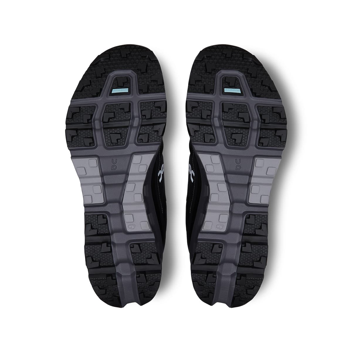 Soles of the On Cloudvista 2 Black Eclipse men’s running shoes