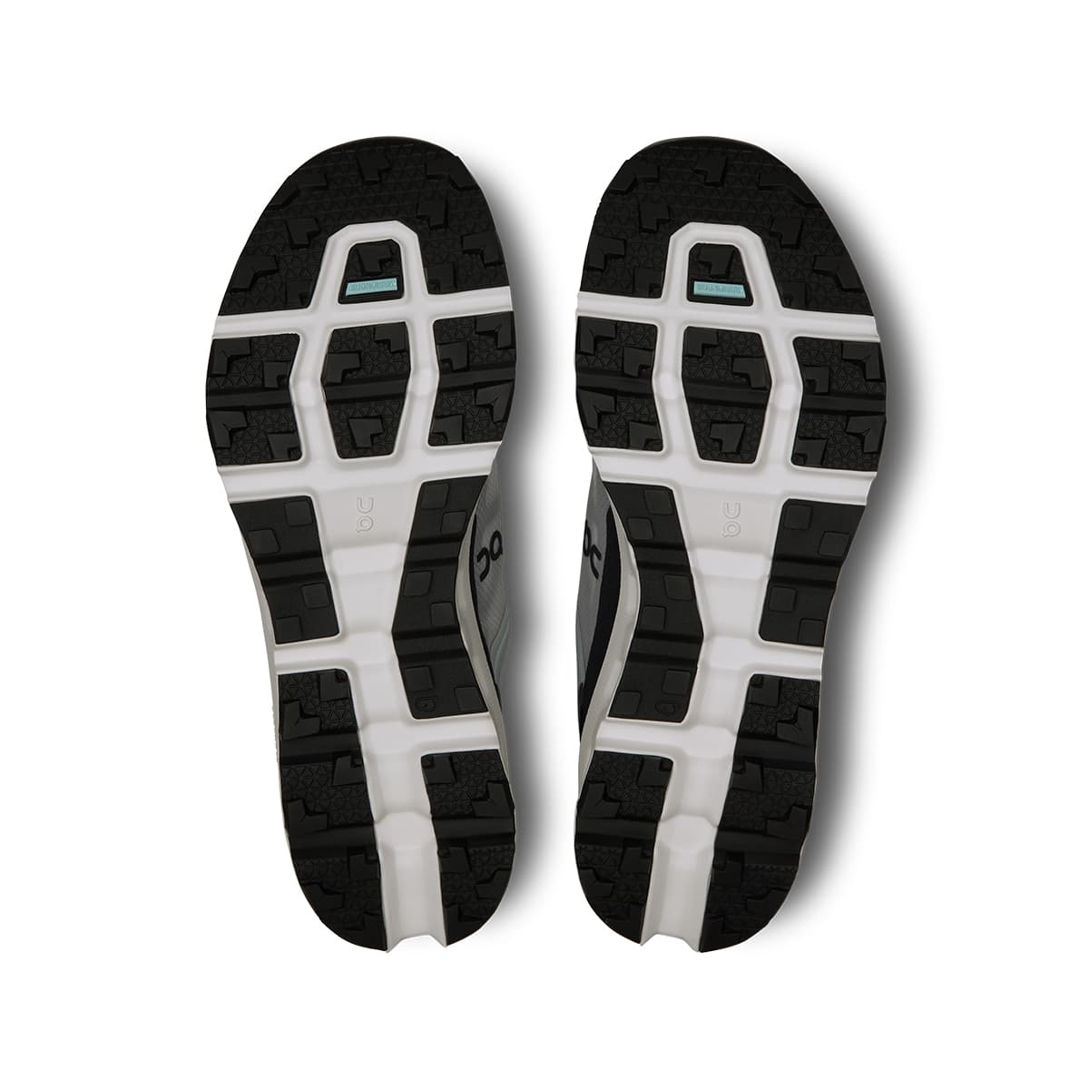 Soles of the On Cloudvista 2 Glacier Eclipse men’s running shoes