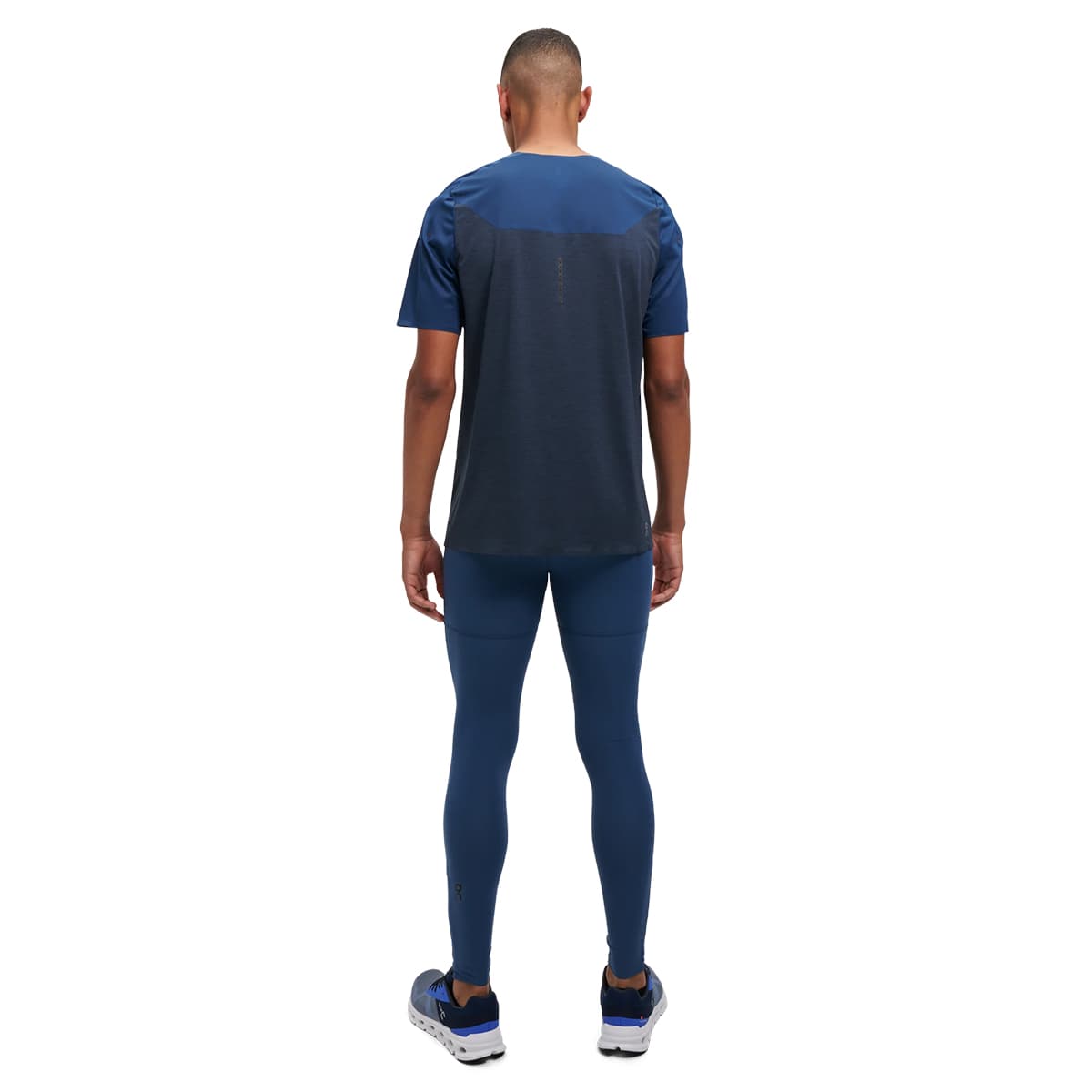 Man wearing the On Performance T Colour Denim-Navy - Back View