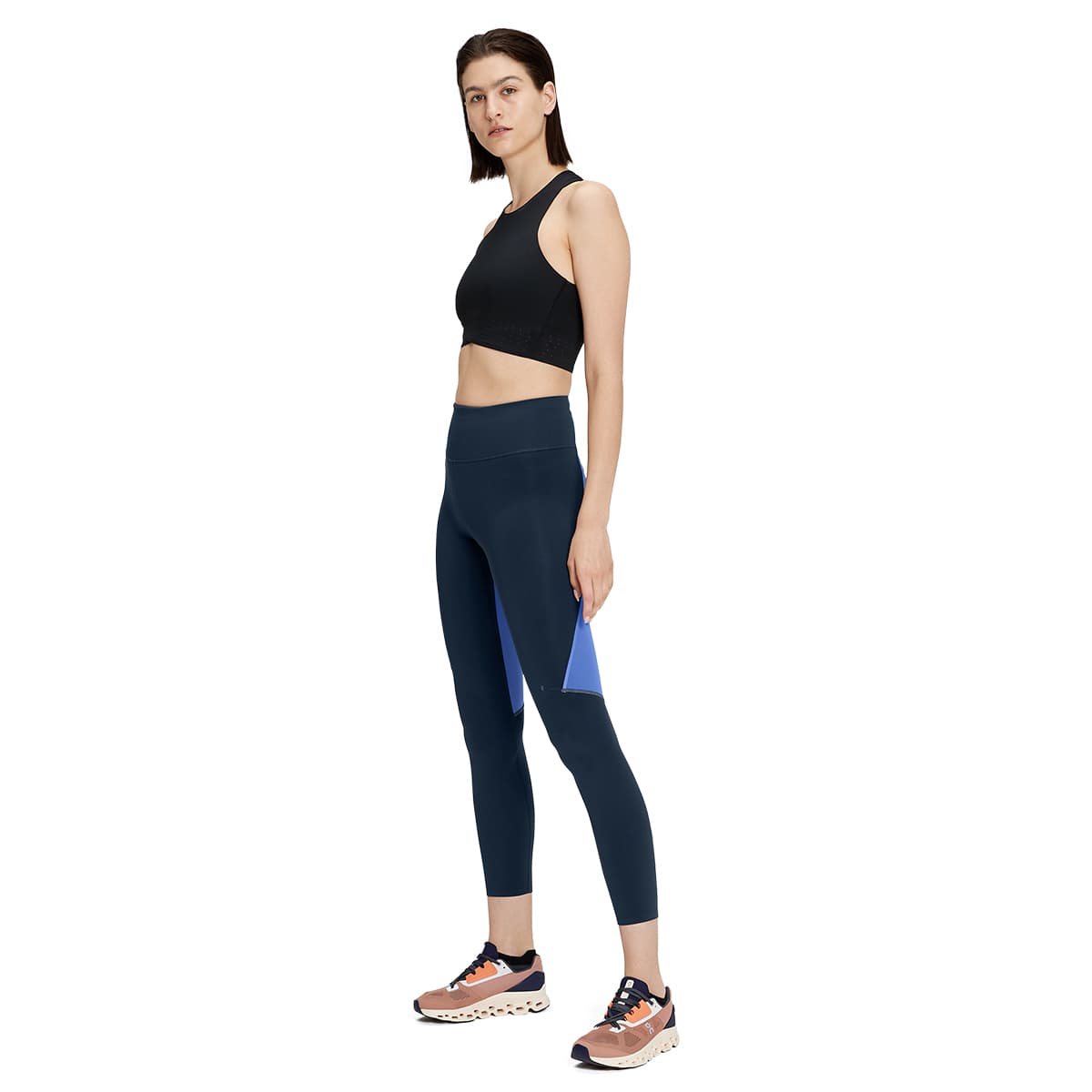 Woman wearing the On Performance Tights 7-8 Colour Navy-Cobalt - Side Profile