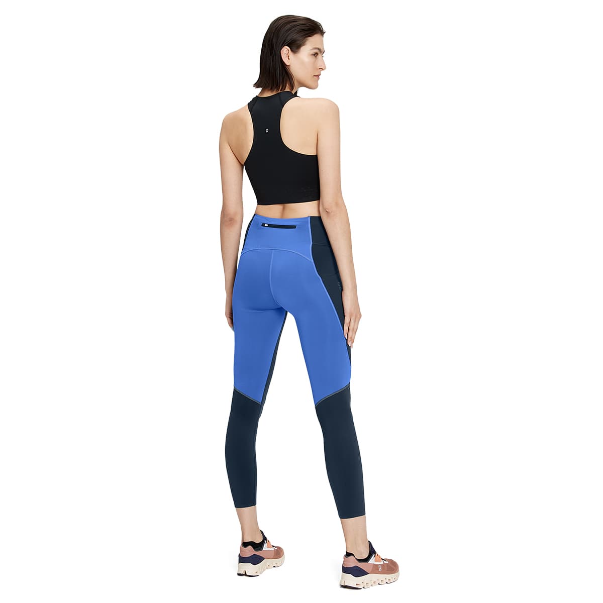 Woman wearing the On Performance Tights 7-8 Colour Navy-Cobalt - Back View